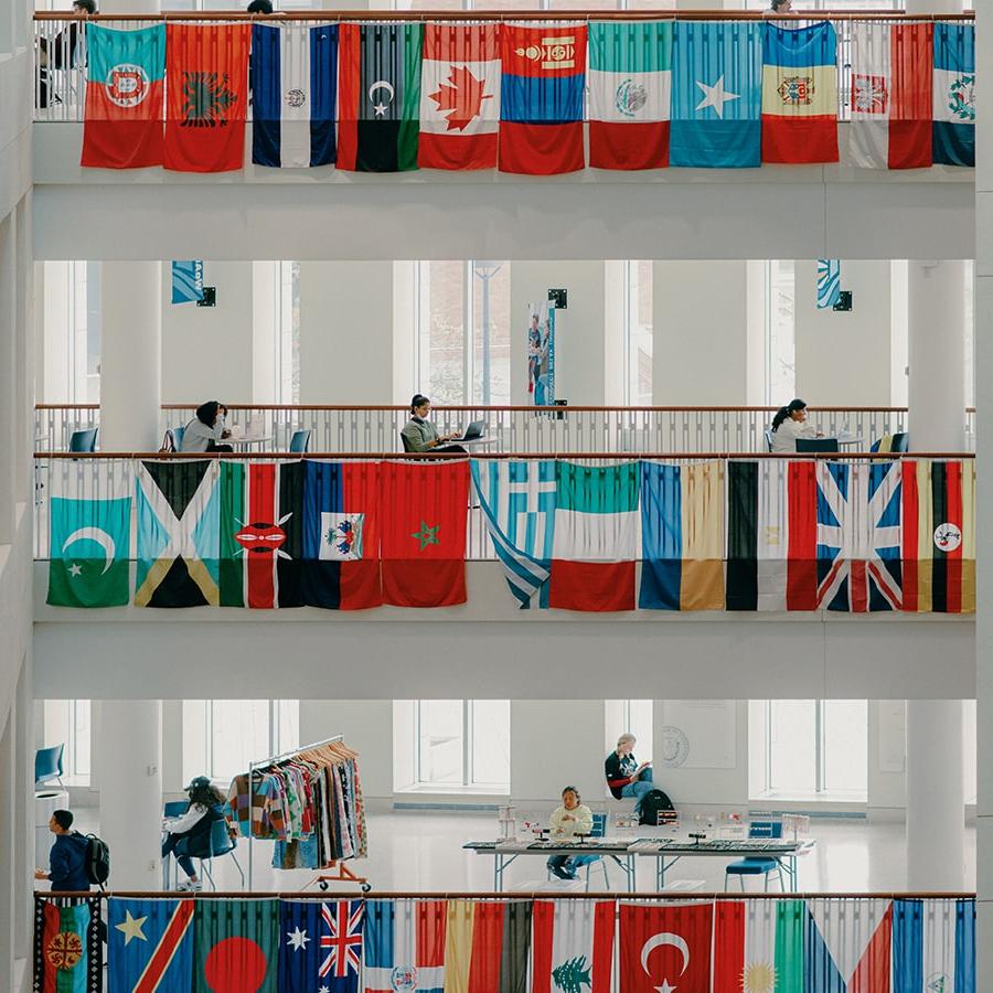 Flags in campus center medium view